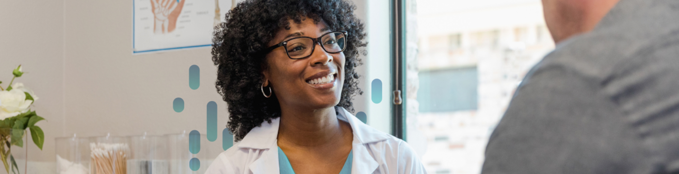 A clinician greets a patient